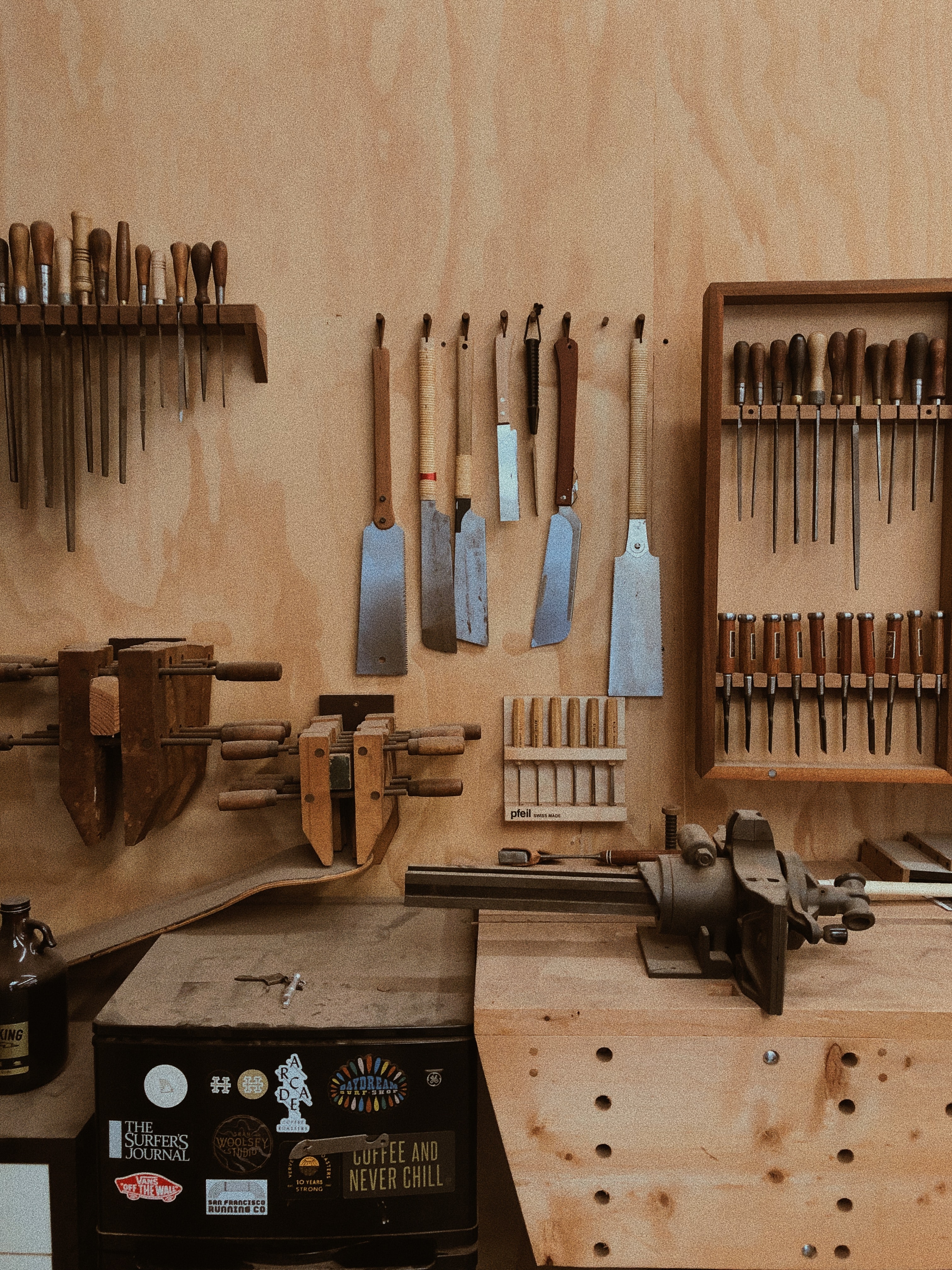 wood workshop with tools on the wall